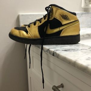Black and Gold Air Jordan’s